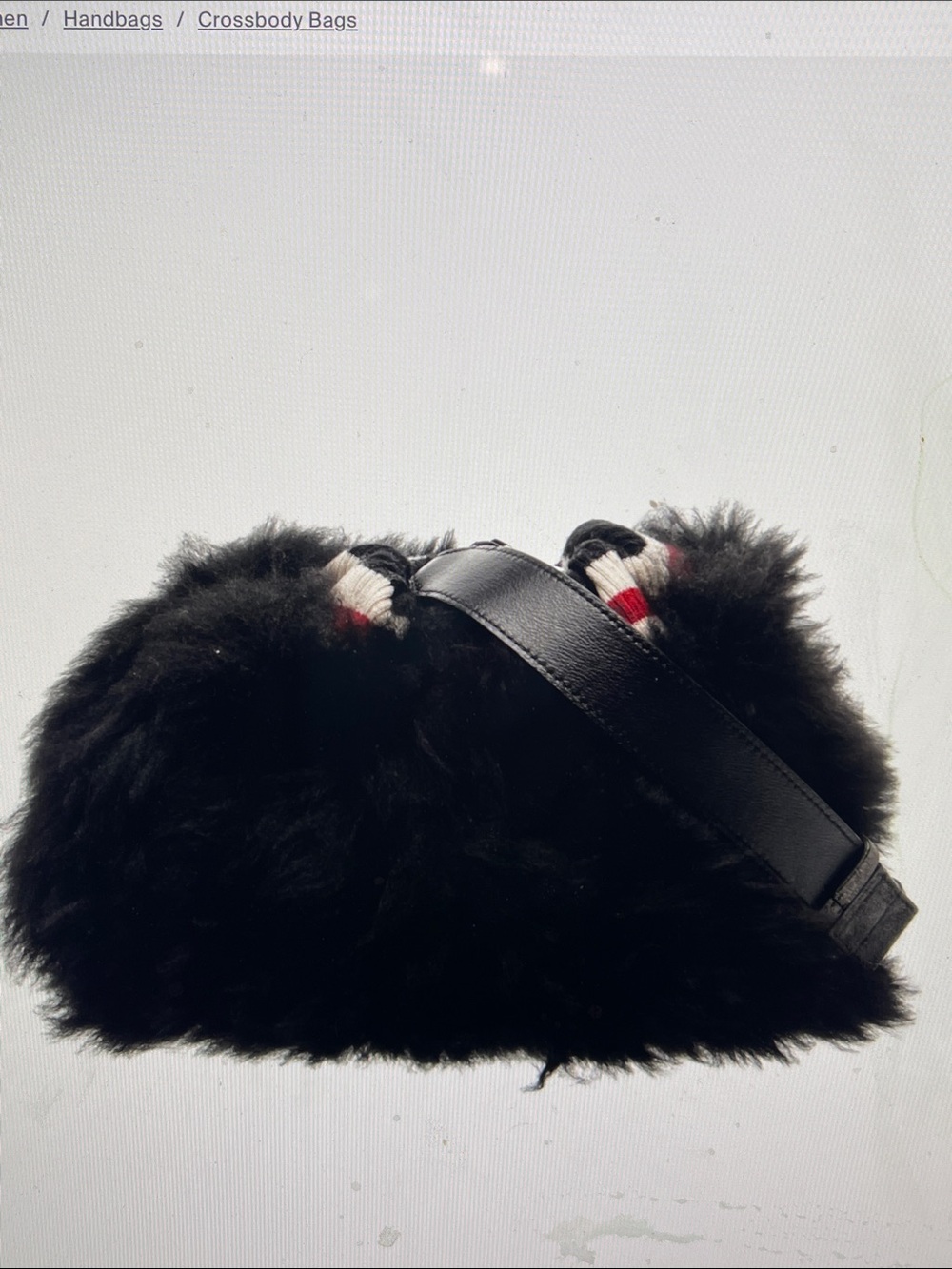 Brunello Cucinelli
Black fur crossbody
